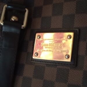 Louis Vuitton purse brown and black
